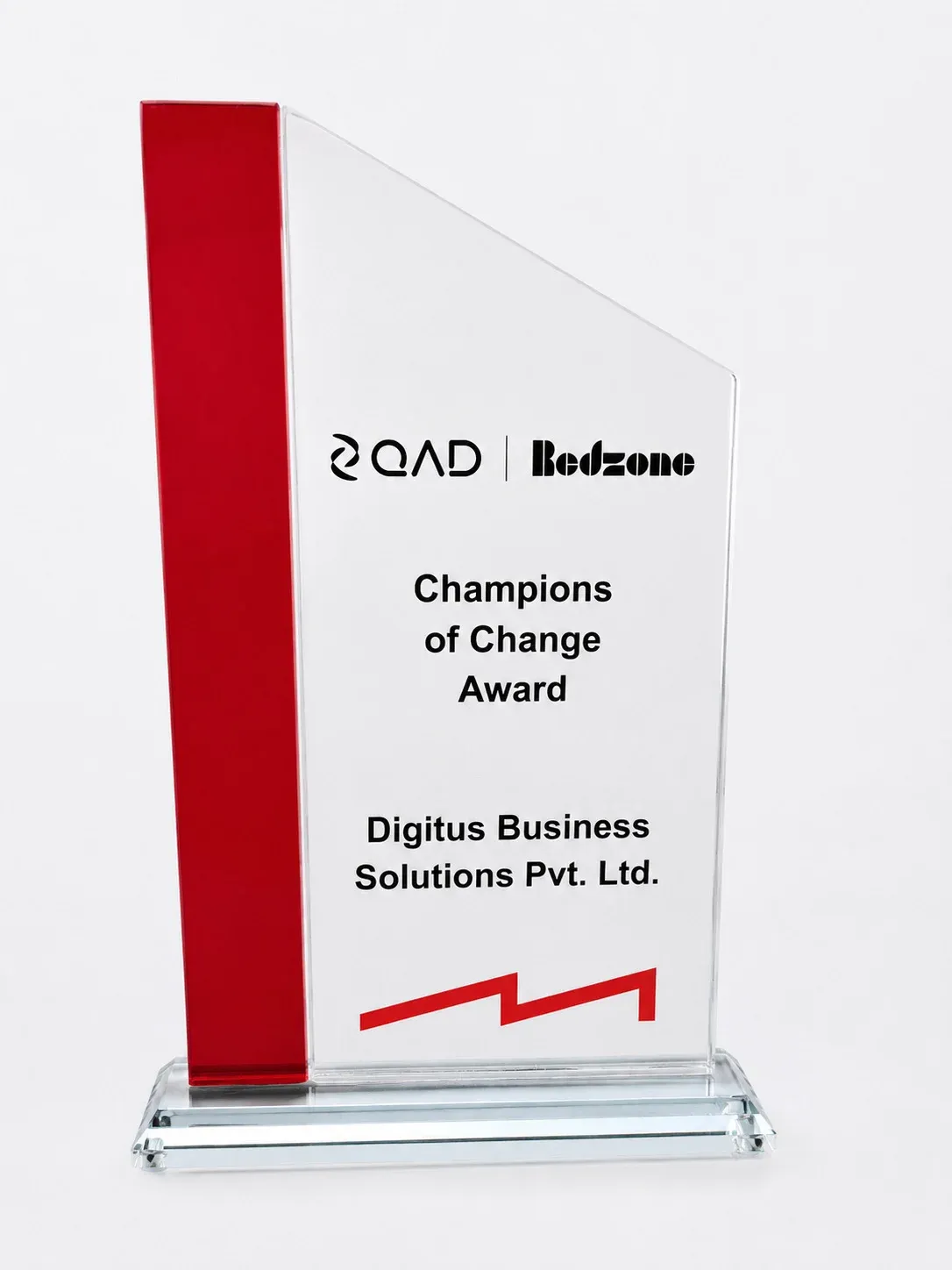 Champions of Change Award: glass trophy from QAD and Redzone, presented to Digitus Business Solutions Pvt. Ltd.